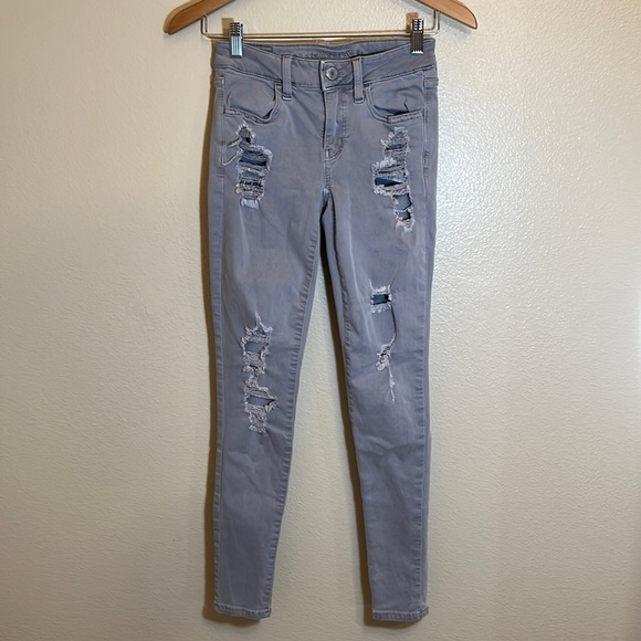 𝅺AMERICAN Eagle Outfitters Super Stretch Grey Distressed Jeans - Picture 1 of 15